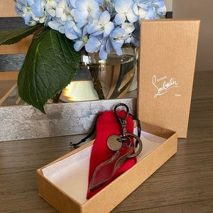 Christian Louboutin enameled sole key ring.